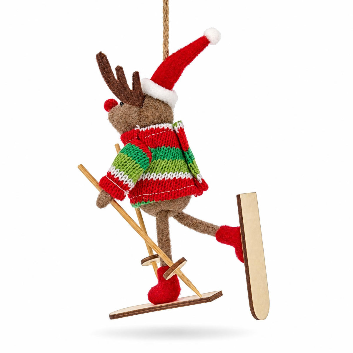 Felt reindeer skiing ornament with raised skis, striped sweater, and red Santa hat