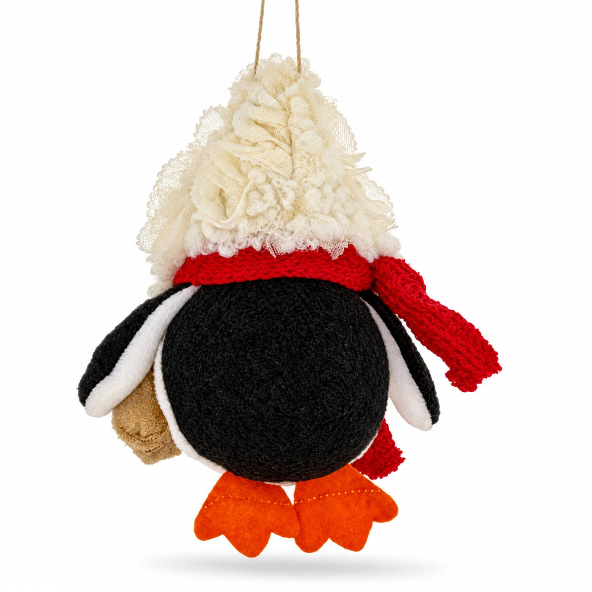 Felt penguin ornament back view with textured cream hood, red scarf, burlap gift