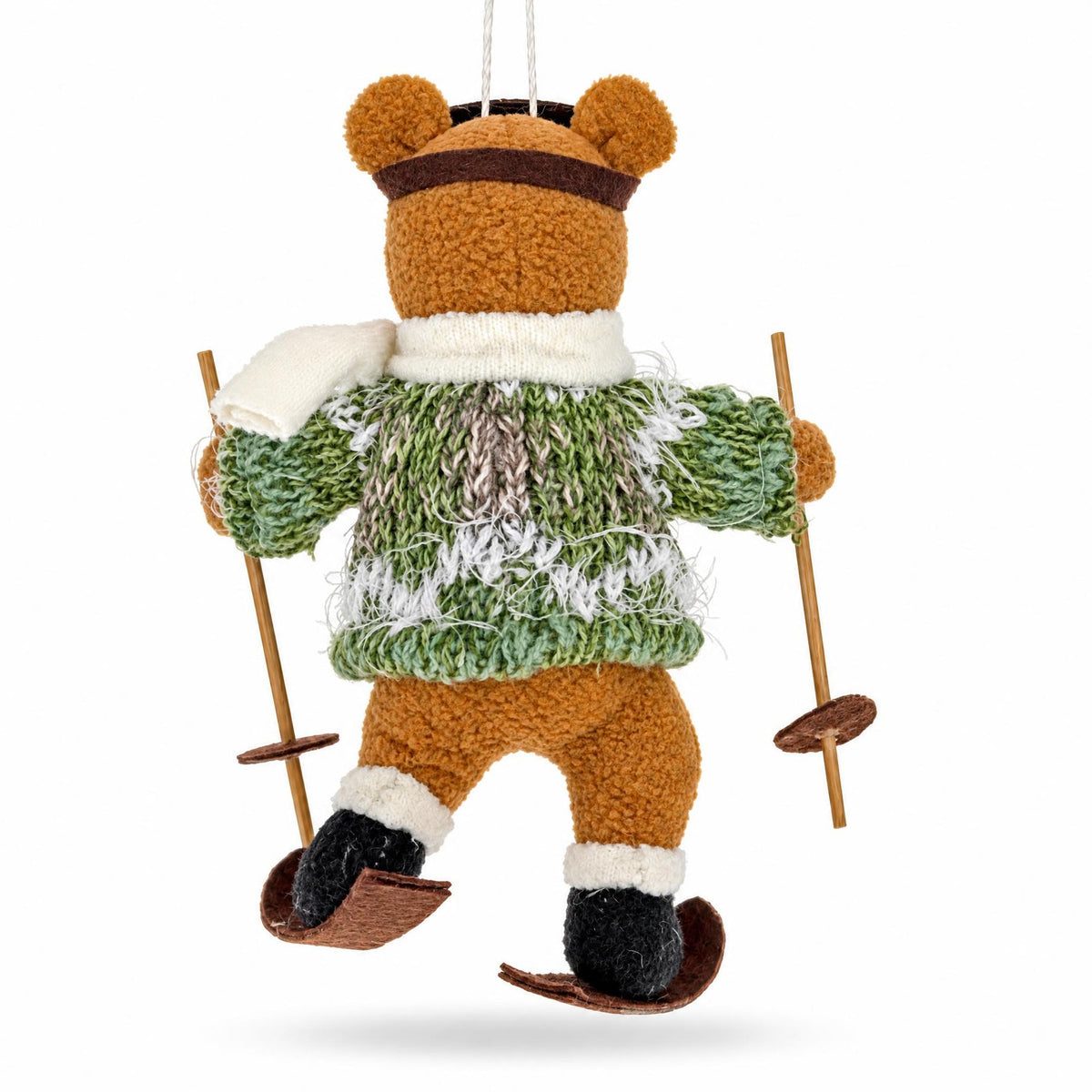 Skiing bear felt ornament from behind with green textured sweater, white scarf, ski poles