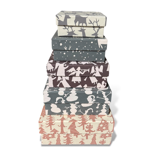 Stack of square gift boxes, gray deer and tree print with stacked lids