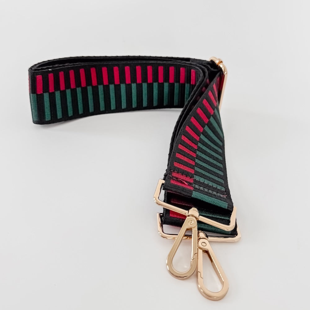 Striped bag strap with gold buckle and two spring clasp hooks in green, black, red