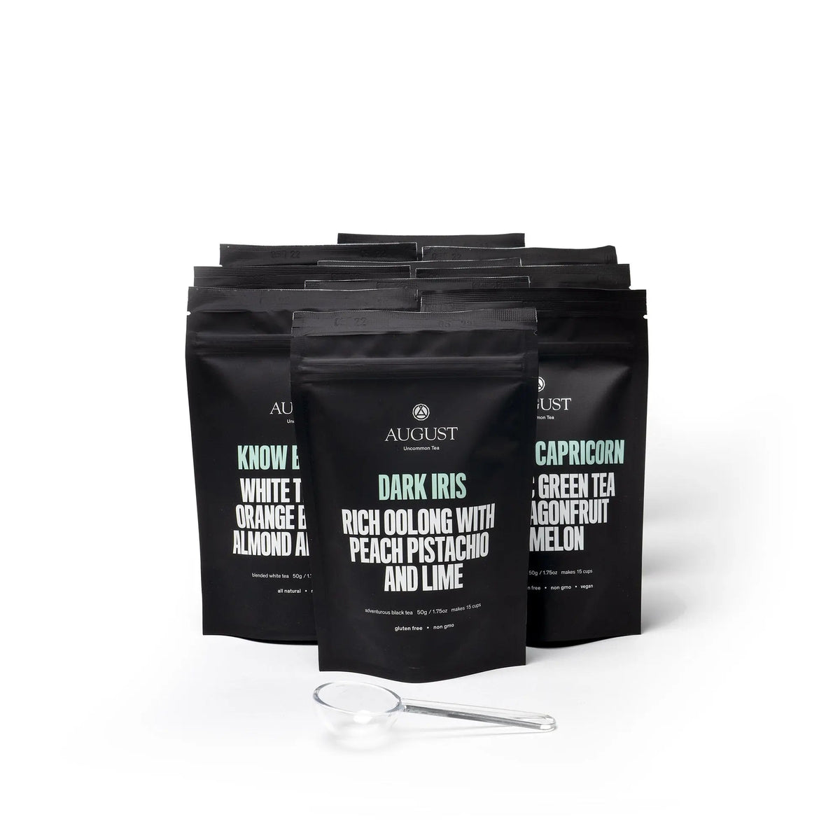 Iced tea sampler of black flavor pouches with a clear measuring scoop