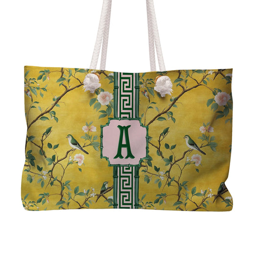 Yellow personalized mahjong tote bag with white rope handles and green monogram