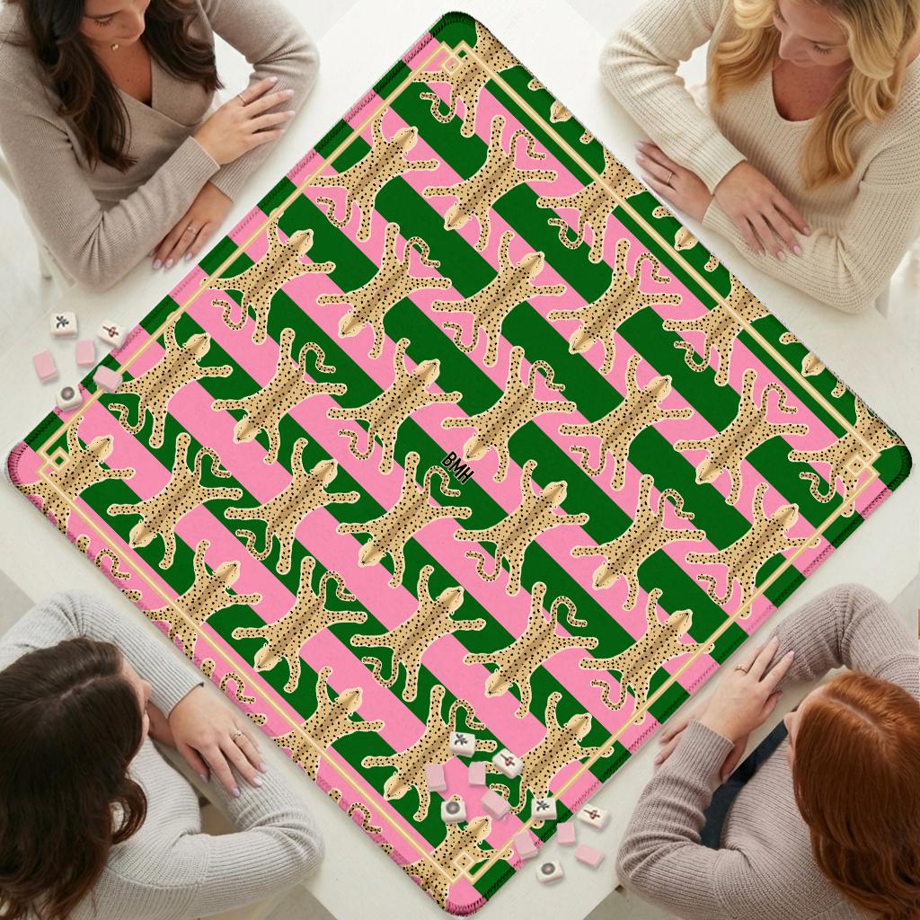 Custom Mahjong mat with repeating tan spotted motifs on a green and pink pattern