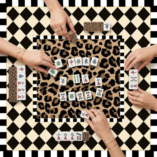 Mahjong mat with a leopard-print center and cream-and-black diamond border