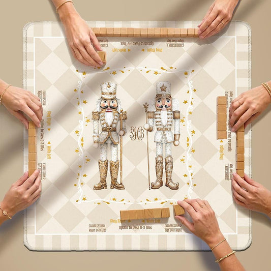 Christmas mahjong mat with nutcracker artwork and players arranging tiles