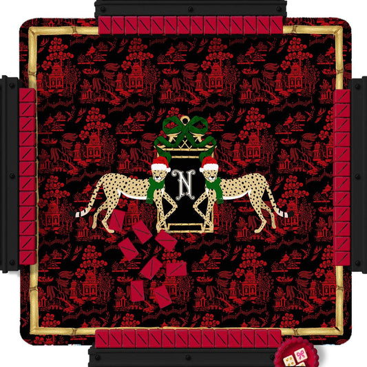 Christmas mahjong mat with red and black pattern, mistletoe, reindeer, and initial N
