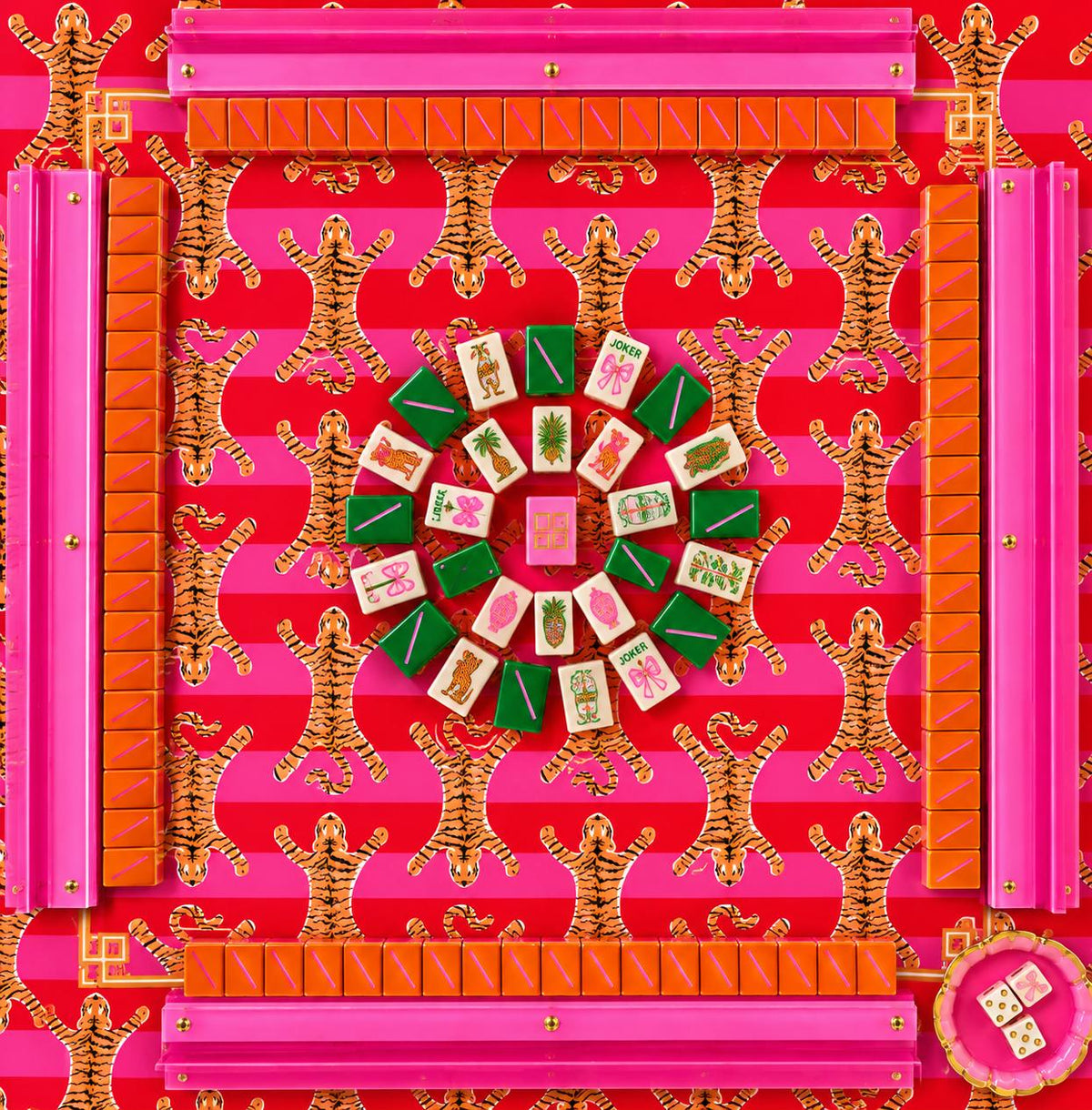Custom Mahjong mat with a pink and red tiger print, surrounded by Mahjong tiles and racks.