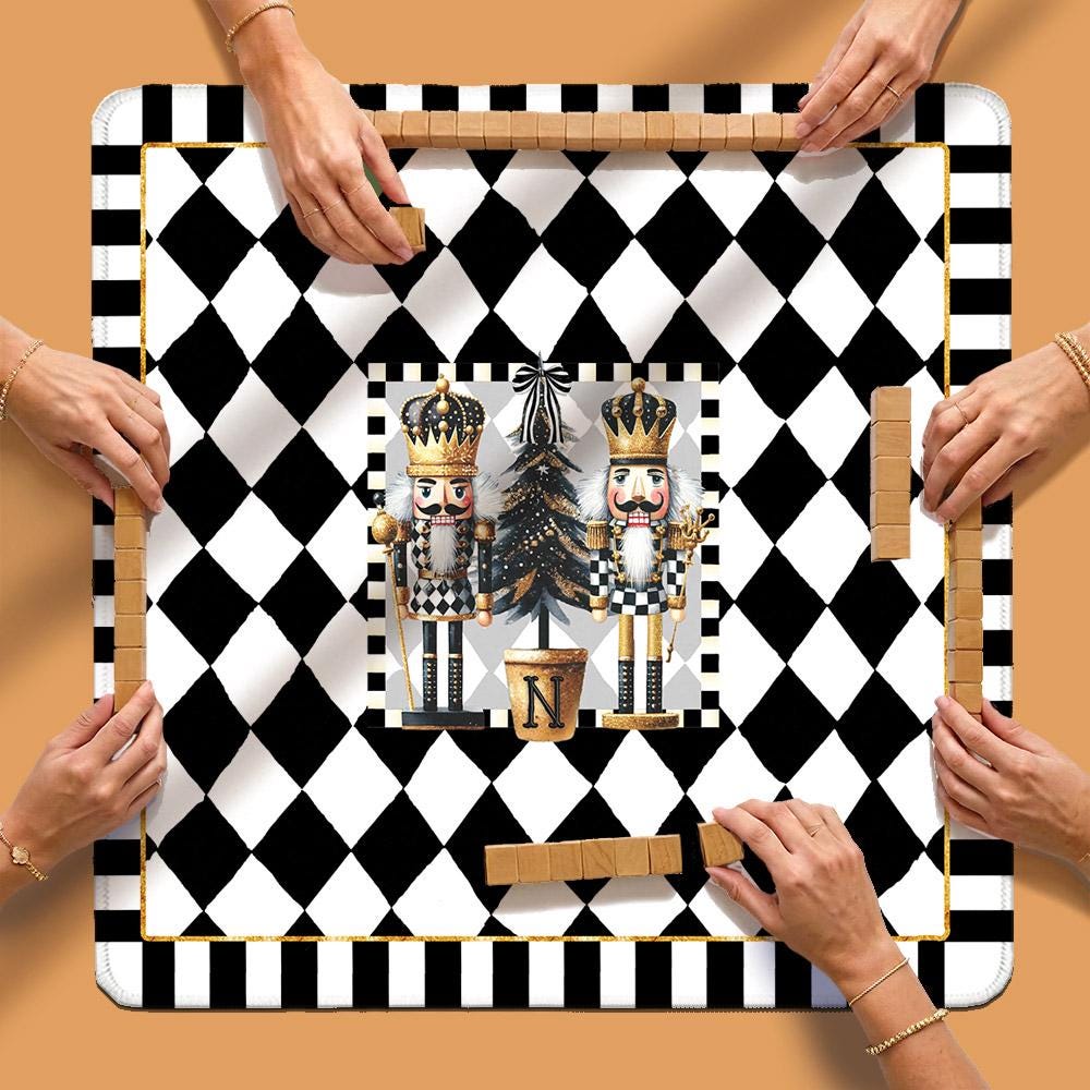 Christmas mahjong mat with diamond pattern and nutcracker tree design, shown in play