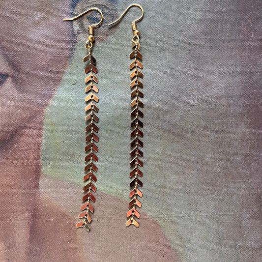 Long brass herringbone drop earrings with gold-tone fishhook and chain detail