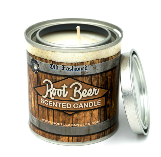 Scented candle in metal tin with wooden Root Beer label and open lid