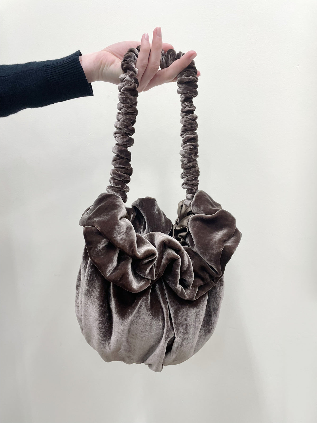 Taupe velvet Bloom bag with a ruffled top and gathered handle
