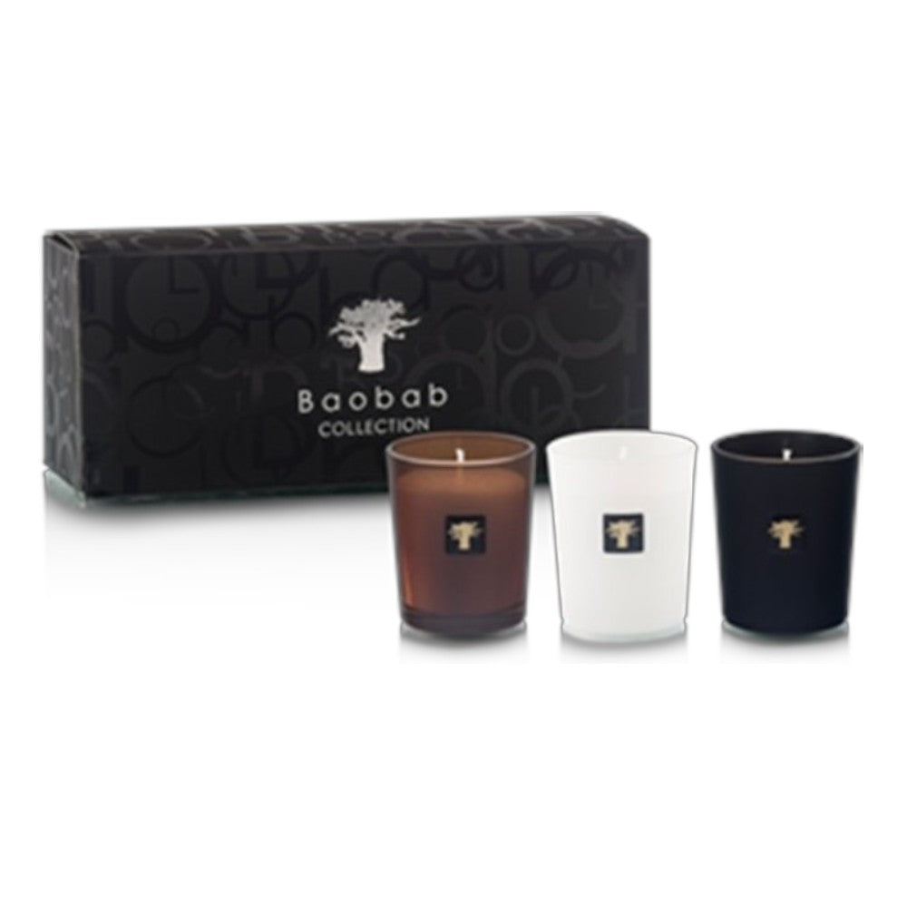 Trio travel candle set: three small scented candles in brown, white, and dark glass cups