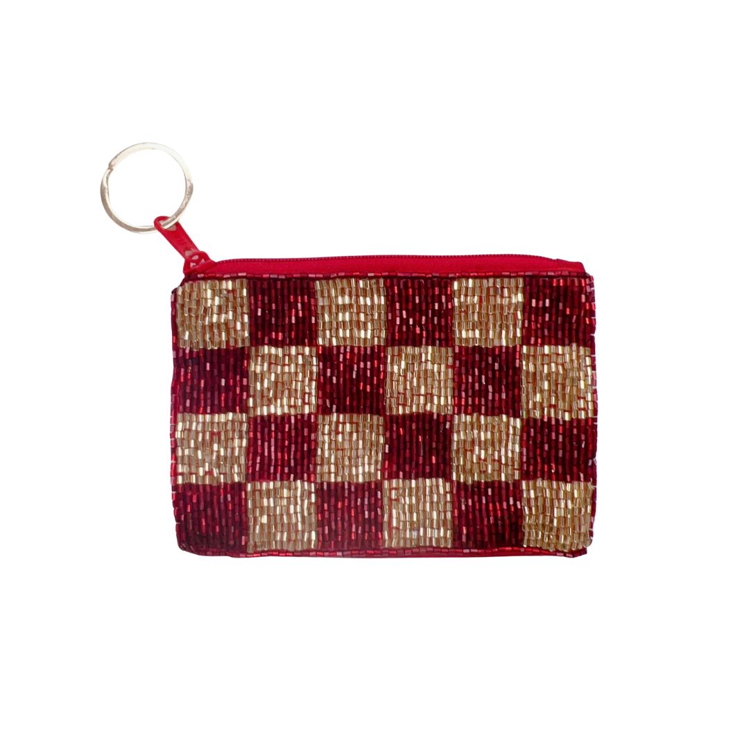 Checkered keychain pouch in maroon and gold woven fabric, with metal ring loop