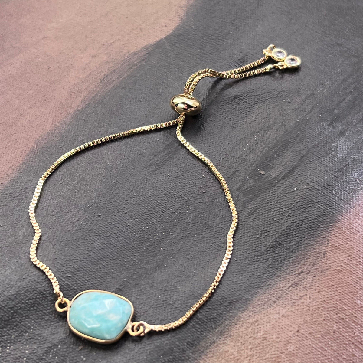 Gold adjustable bracelet with oval turquoise amazonite stone and small link chain