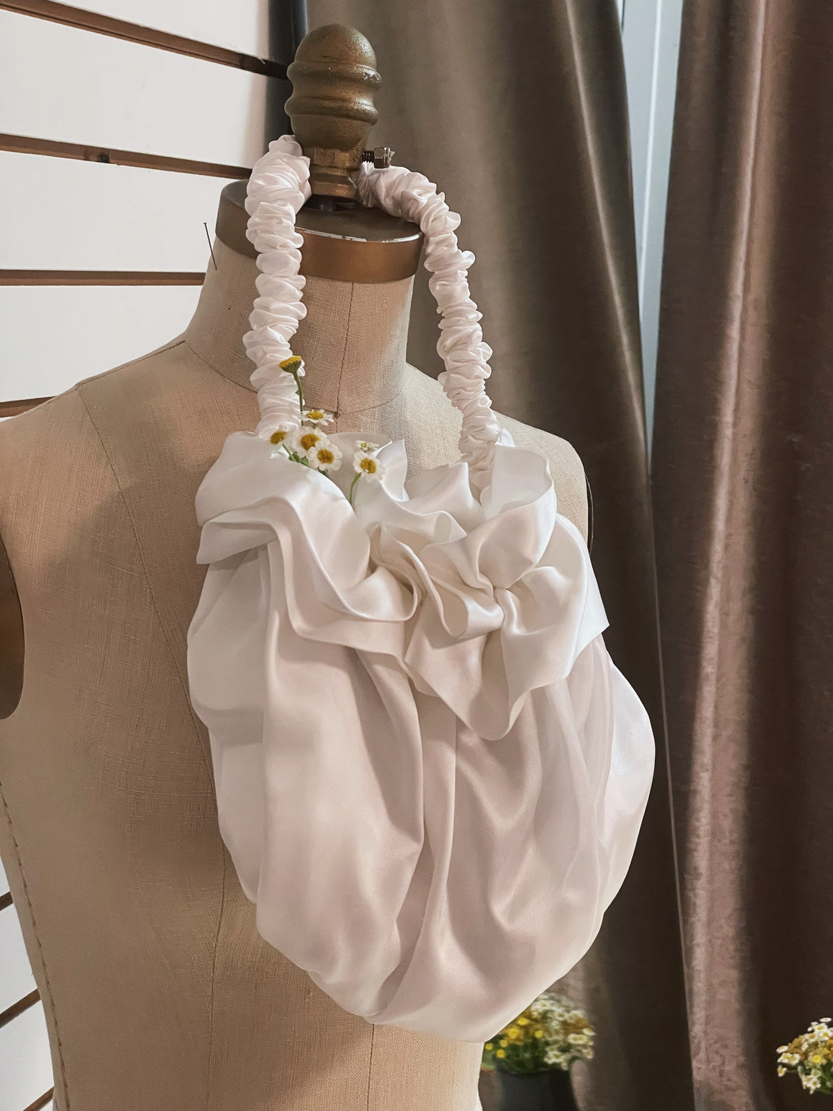 Ivory silk Bloom bag with a ruffled top and gathered handle