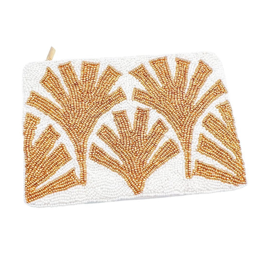 White beaded palm pouch with orange shell pattern and small top loop