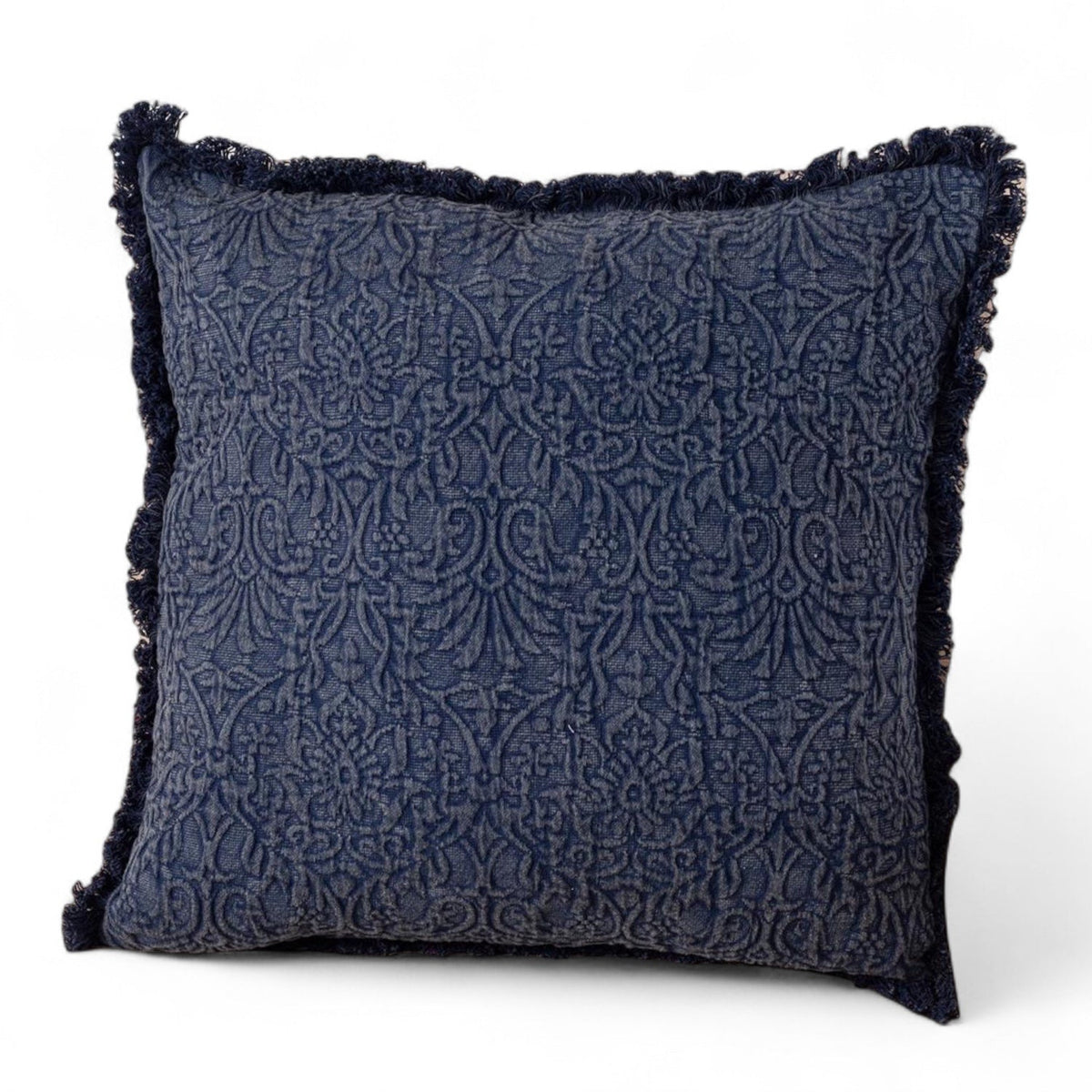 Blue indigo matelassé medallion throw pillow with fringe trim