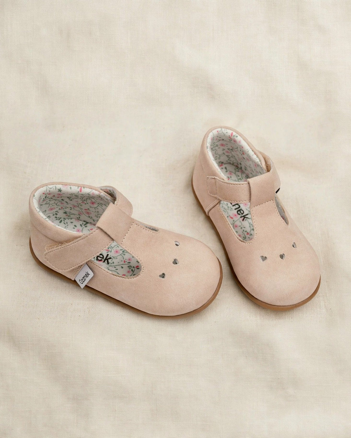 Blush pink kids Mary Jane slip-on shoes with floral inner lining