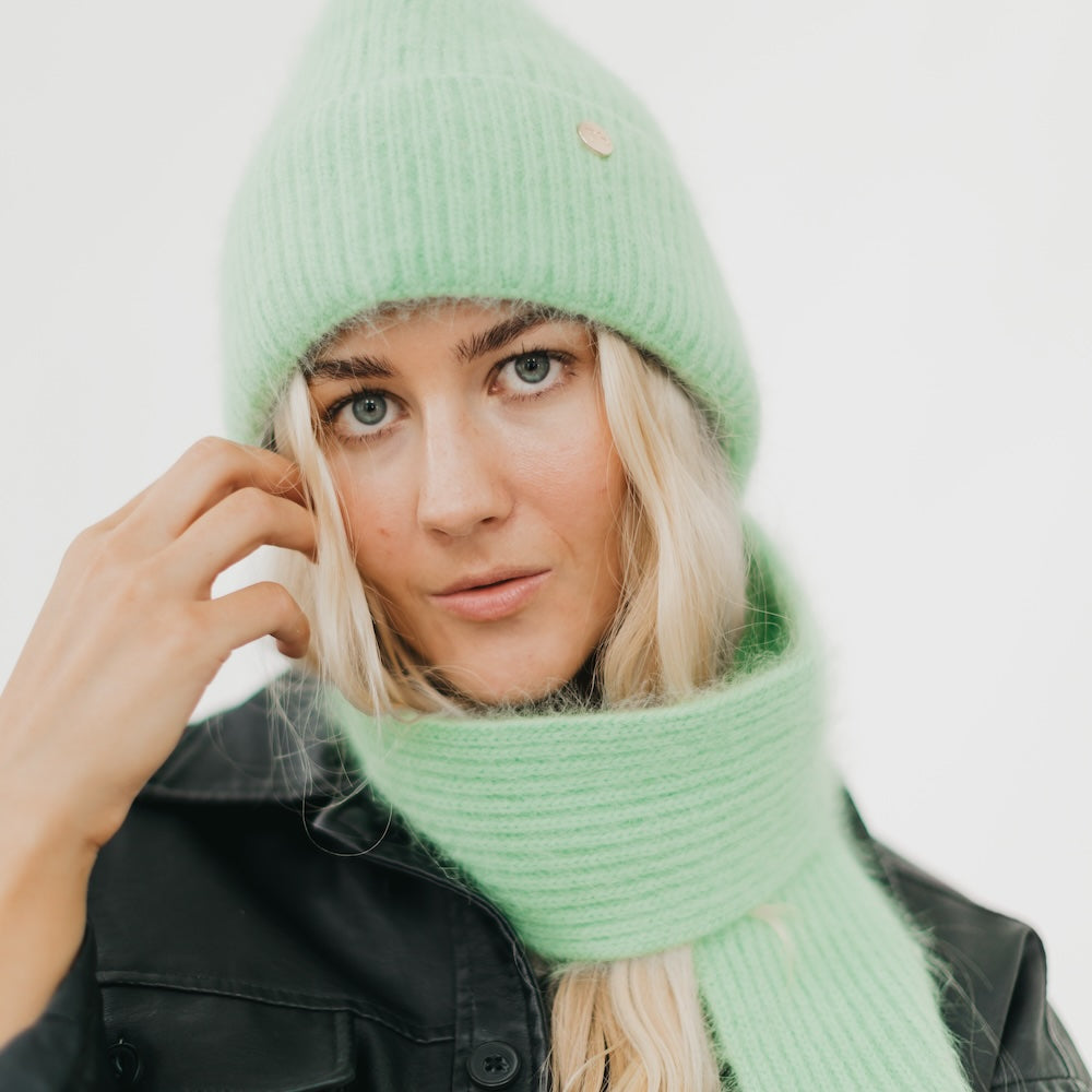 Light green knit beanie and chunky light-green scarf