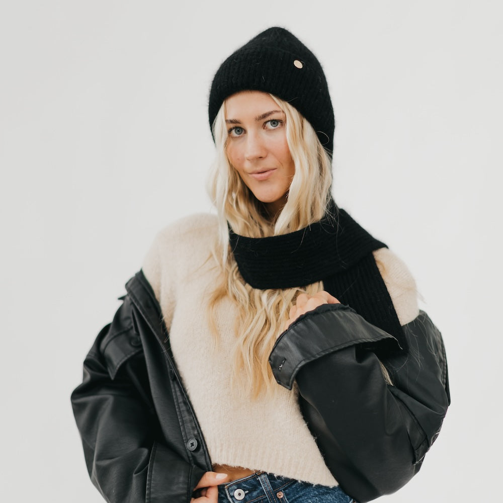 Black knitted beanie and matching black infinity-style scarf set