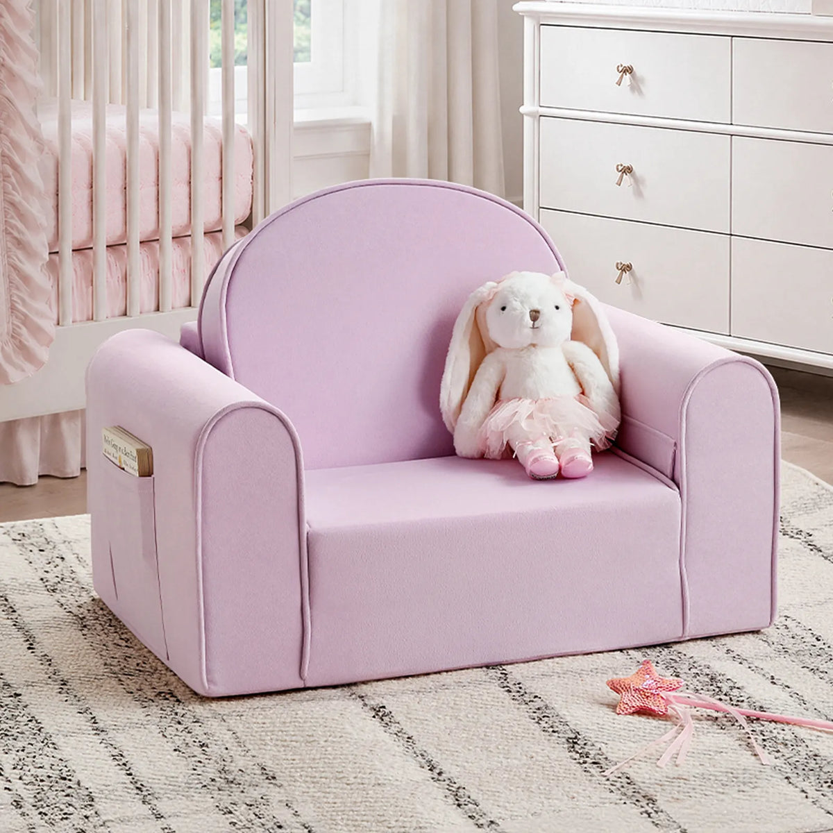 Tiny Land® kids sofa chair in light purple with rounded arms and a plush bunny