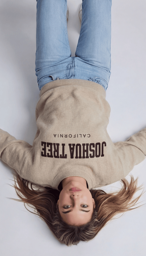 Beige sweatshirt with Joshua Tree California text graphic, ribbed cuffs and hem