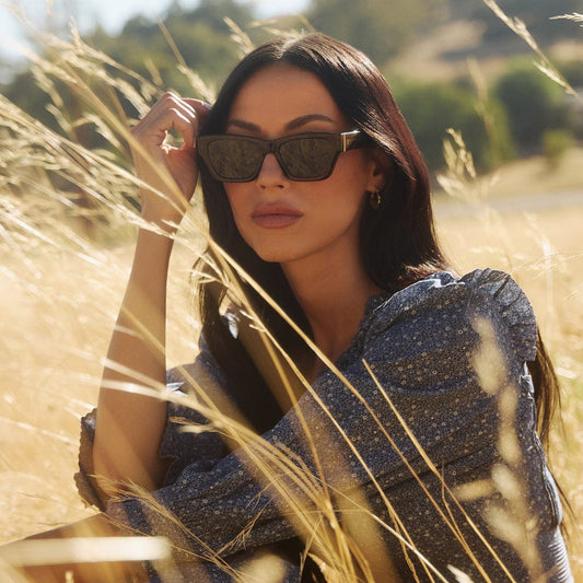 Polarized cat-eye sunglasses with dark lenses and black frame