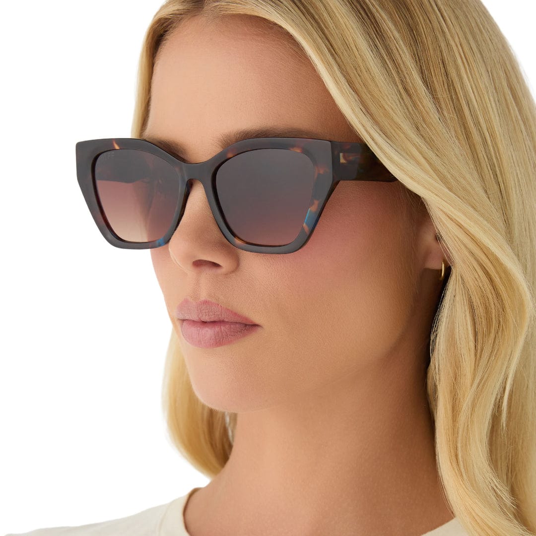 Dark polarized sunglasses with multicolor flecks and brown-tinted lenses