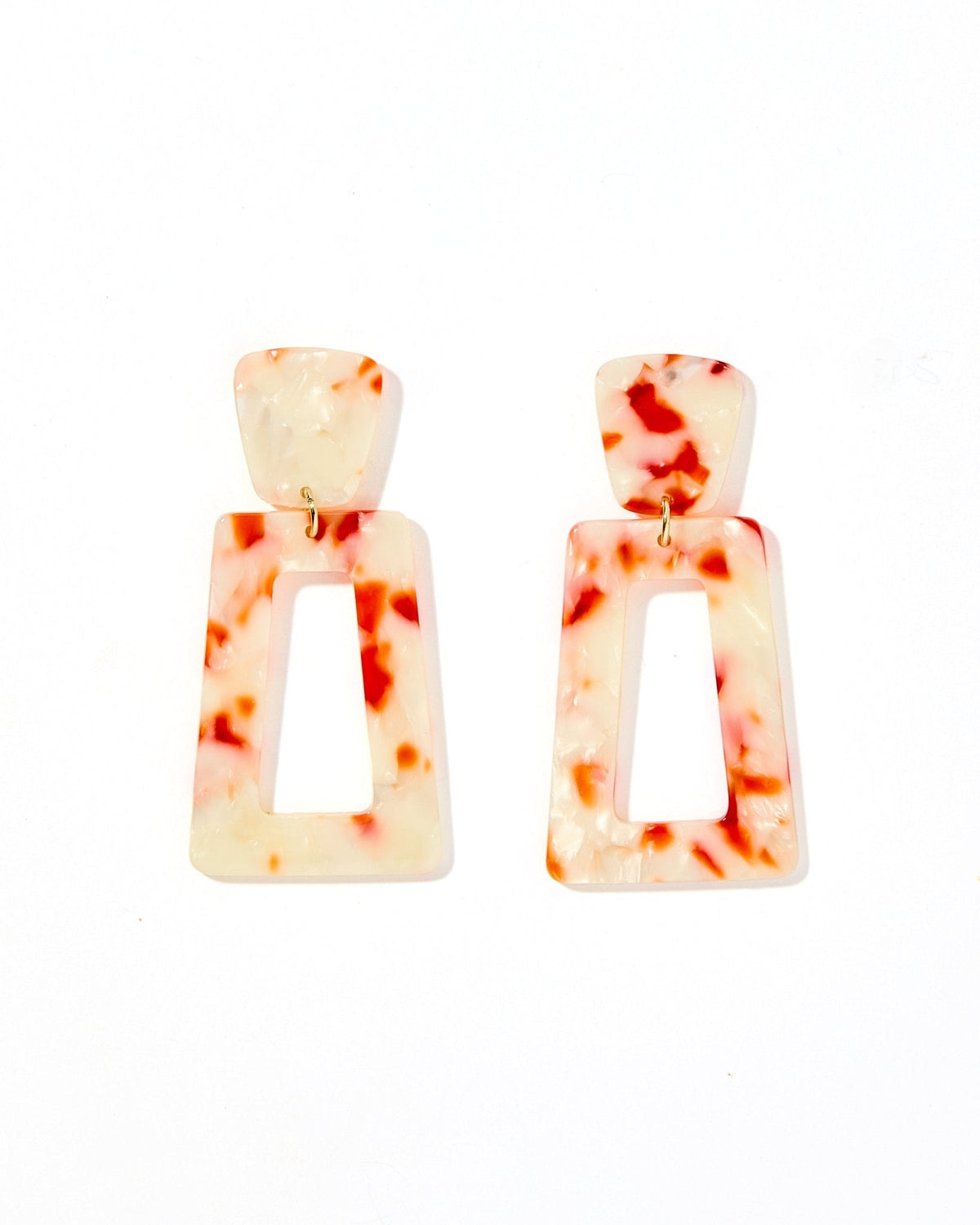 Geometric statement earrings with orange-and-white speckled resin rectangle drops