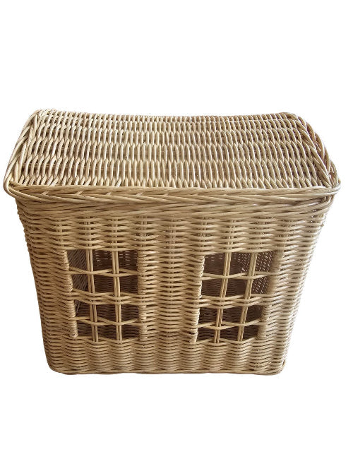 Beige rattan toy storage basket with woven window details and an open top