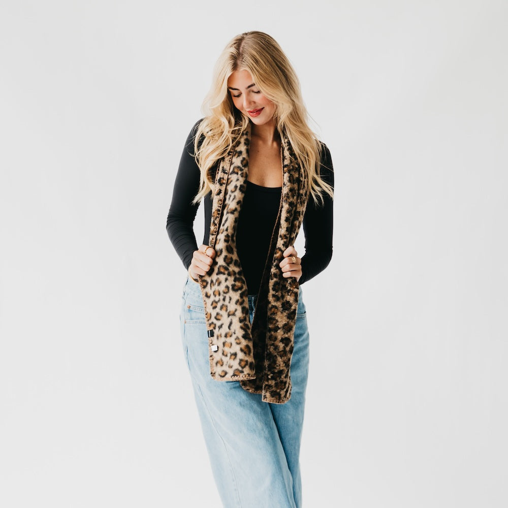 Leopard print scarf with black trim, open front styling over a jacket