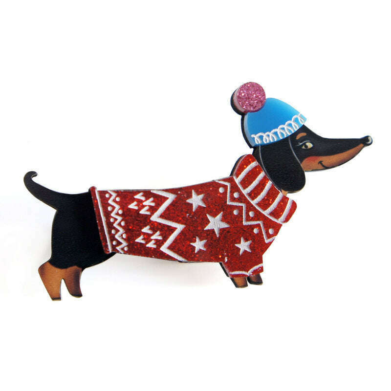 Dog brooch shaped like a black dachshund with red star sweater and blue cap