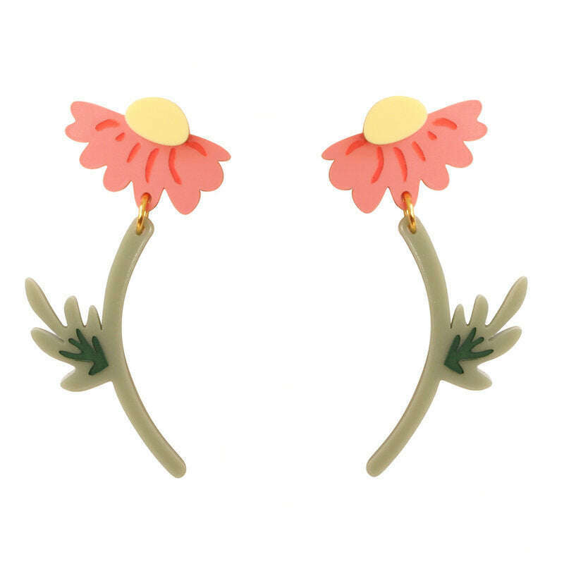 Flower earrings with pink blossoms, yellow centers, and green leaf accents