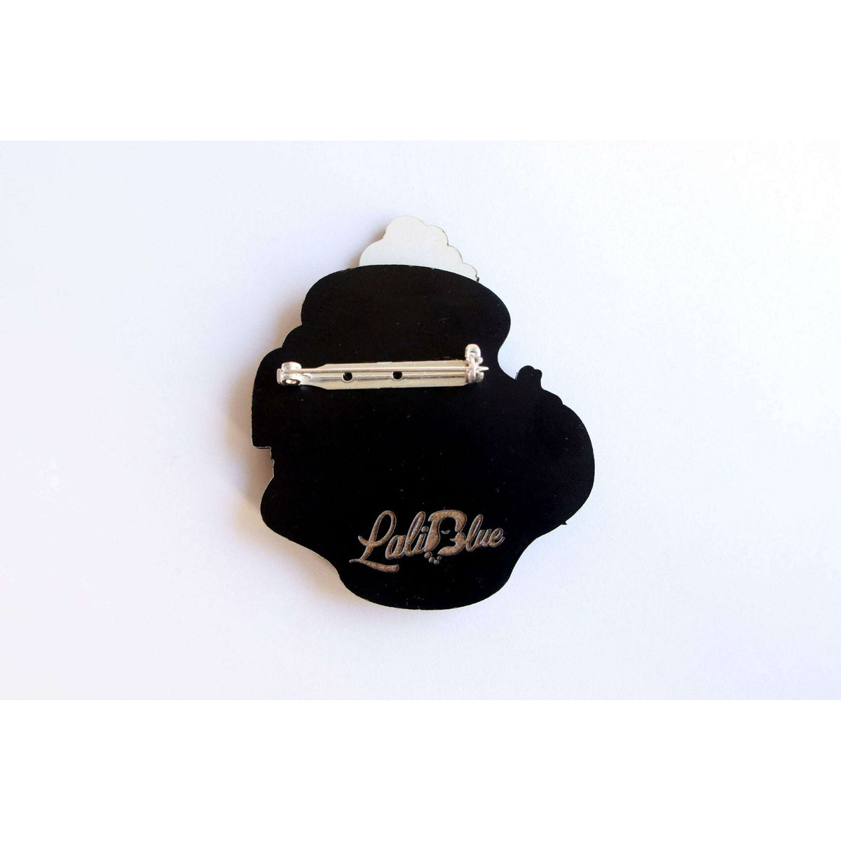 Jazz concert brooch back with metal pin and Laliblue logo