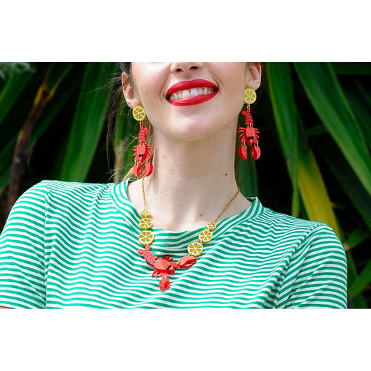 Lobster necklace with gold chain and red lobster charm with citrus slice beads