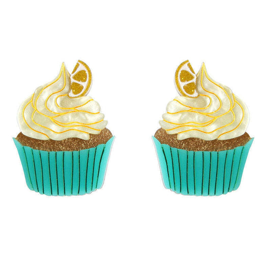 Muffin-shaped stud earrings with cream frosting, yellow citrus slice, and teal cupcake base
