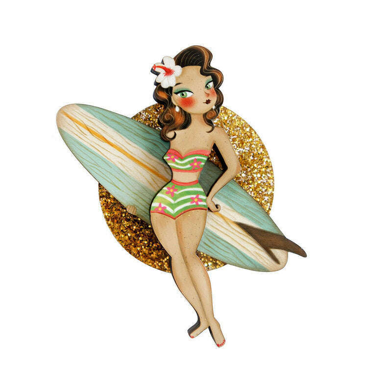 Laliblue surfer girl enamel brooch with glitter gold oval backing and surfboard wings