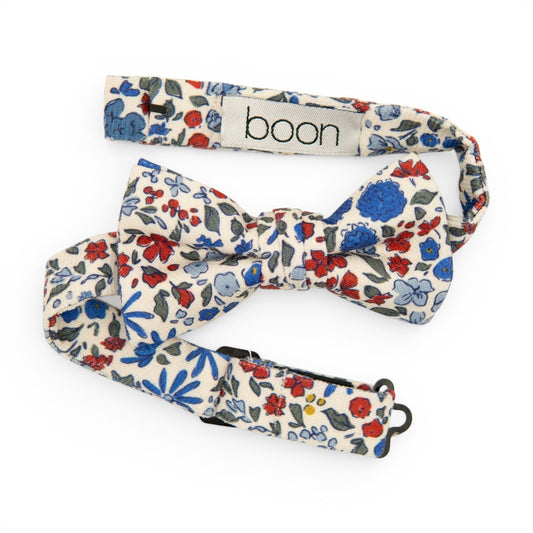 Boys floral bow tie with blue, red, and white flower pattern