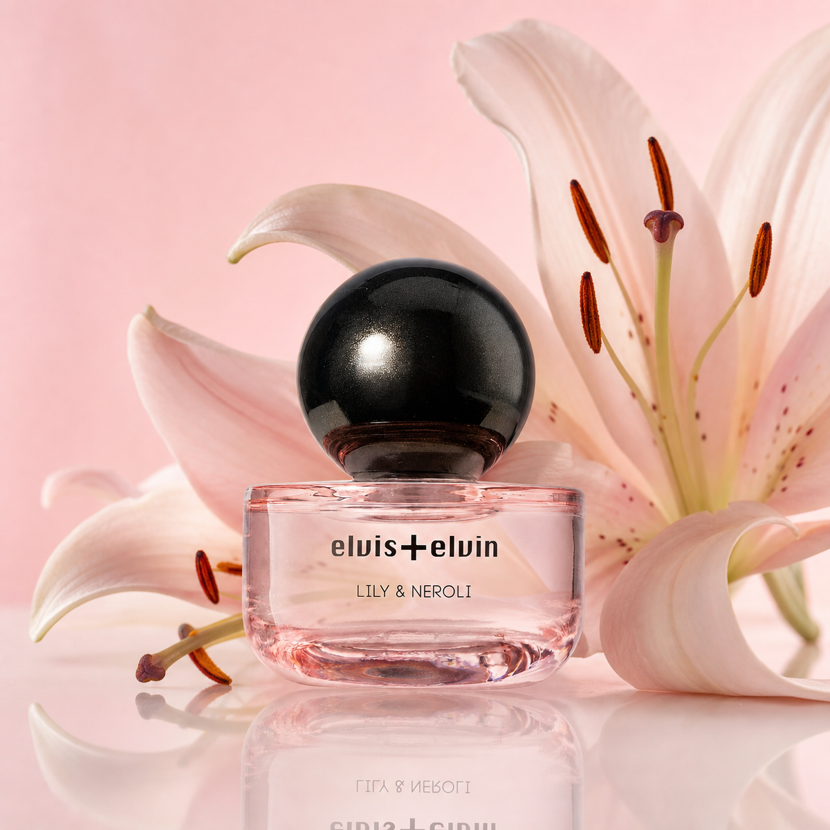 Lily & Neroli perfume bottle with black sphere cap and lily flowers