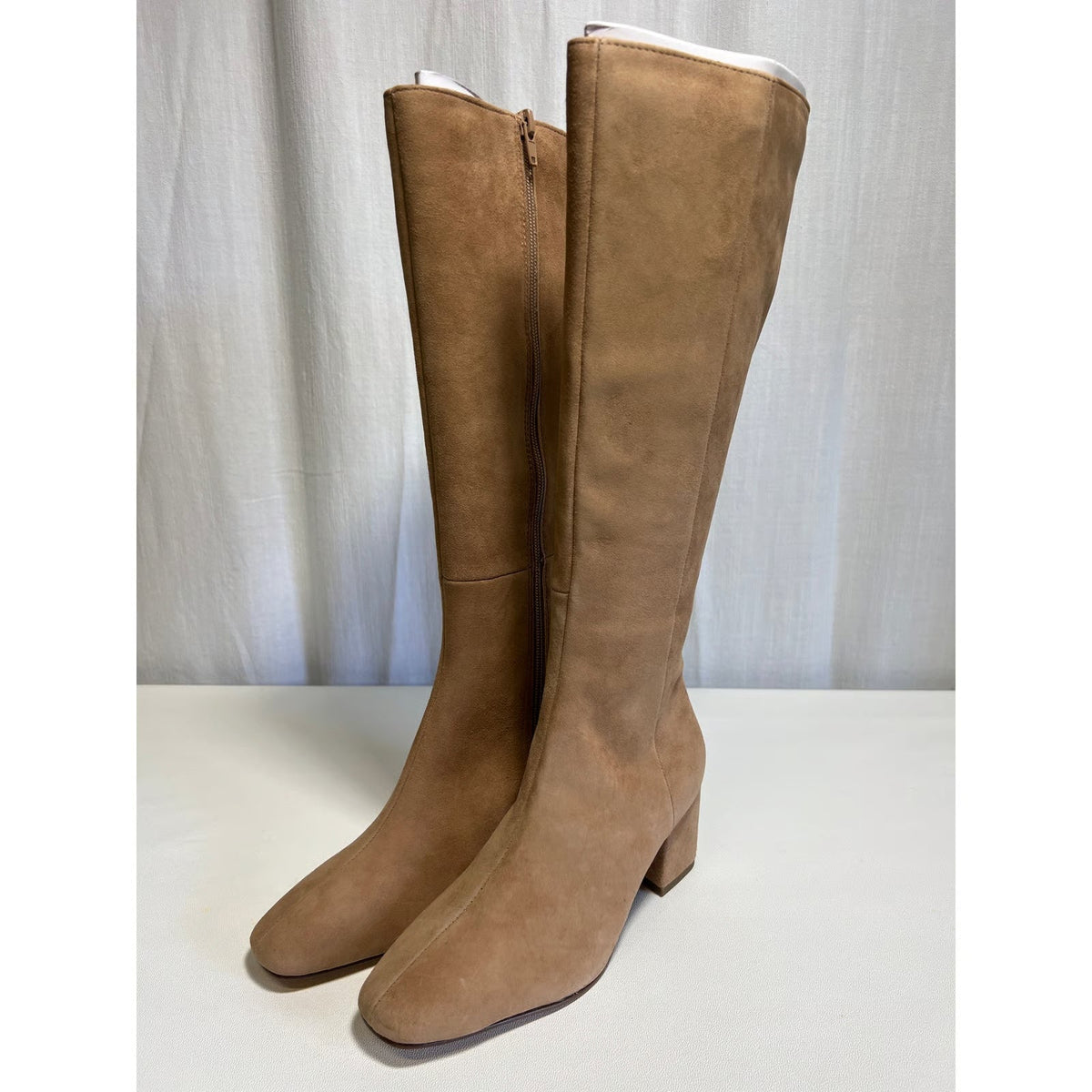 Pair of Ann Taylor suede tall boots with side zippers and block heels