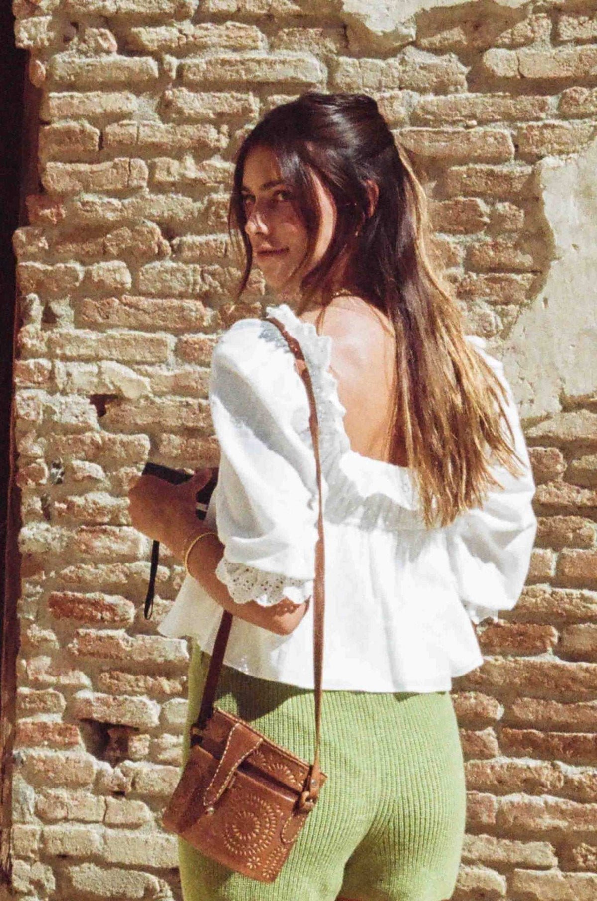 White puff-sleeve lace crop blouse with square neckline and tied drawstring at center