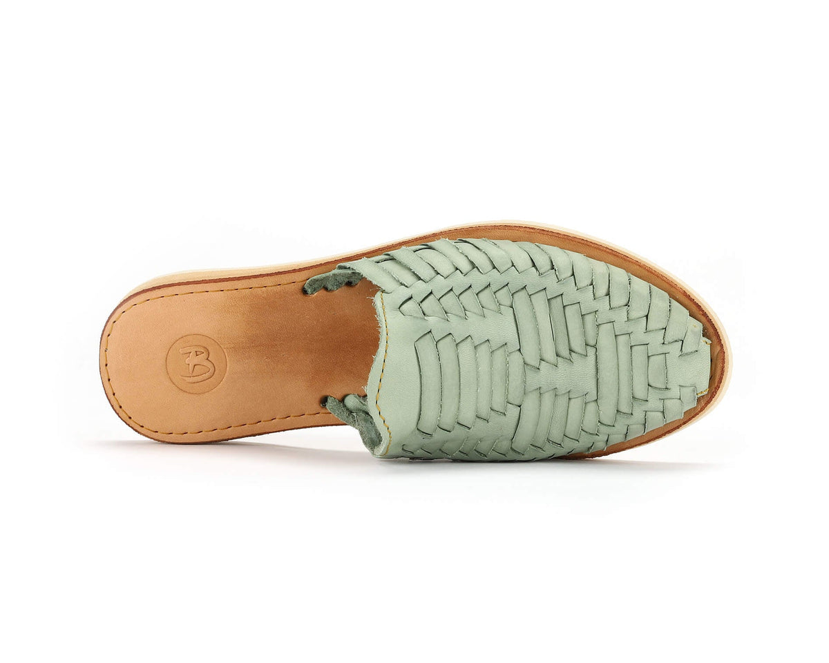 Teal woven huarache slip-on sandal with leather footbed and tan outsole