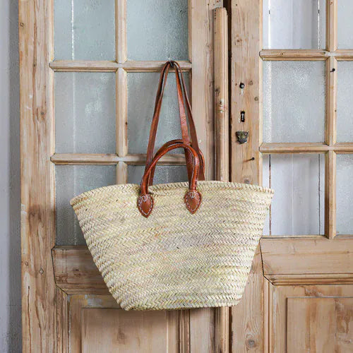 Marche woven shoulder tote bag with tan leather handles and heart-shaped trim