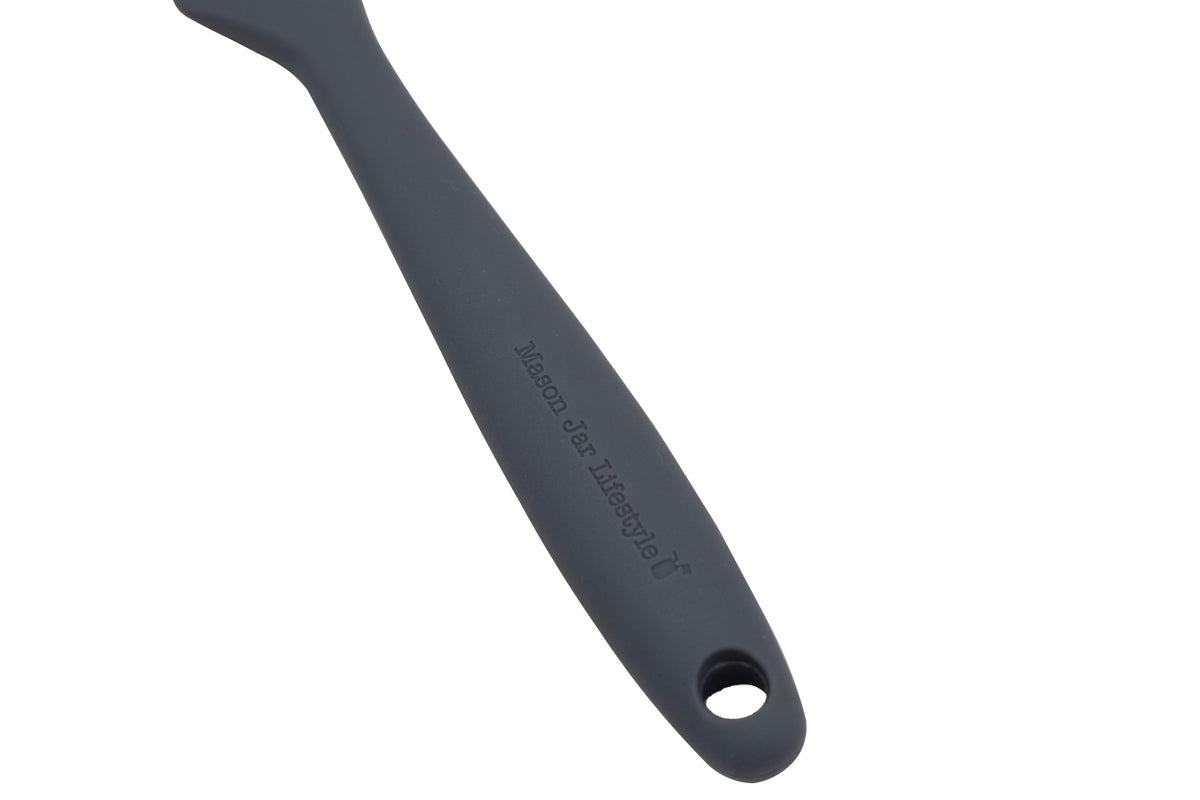 Gray silicone scraper handle with circular hanging hole
