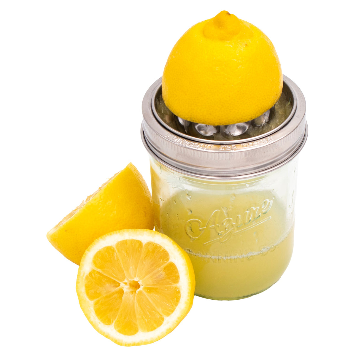 Stainless steel wide-mouth mason jar juicing lid pressing a lemon