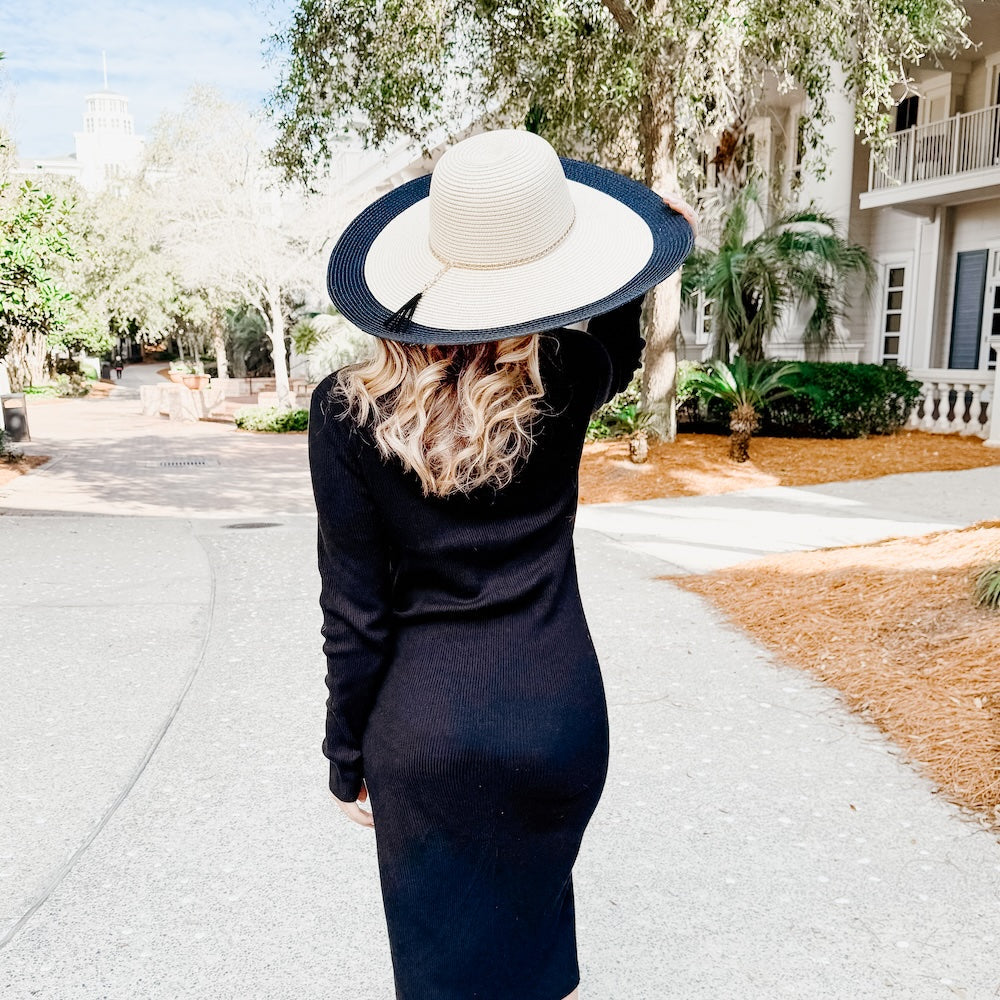 Cream straw wide-brim floppy sun hat with navy band