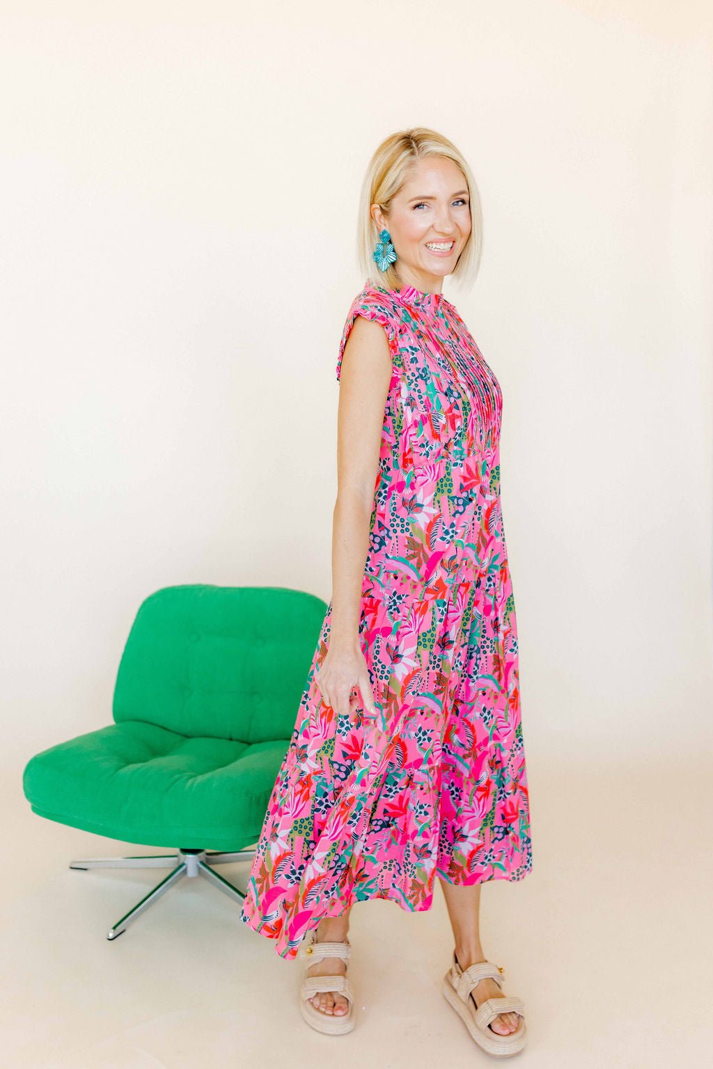 Turquoise statement earrings with heart top and layered fan flower silhouette