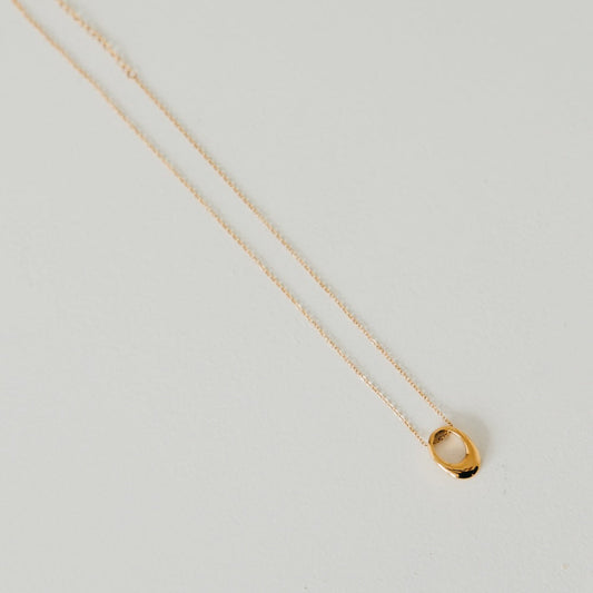 Gold chain necklace with mini open oval pendant