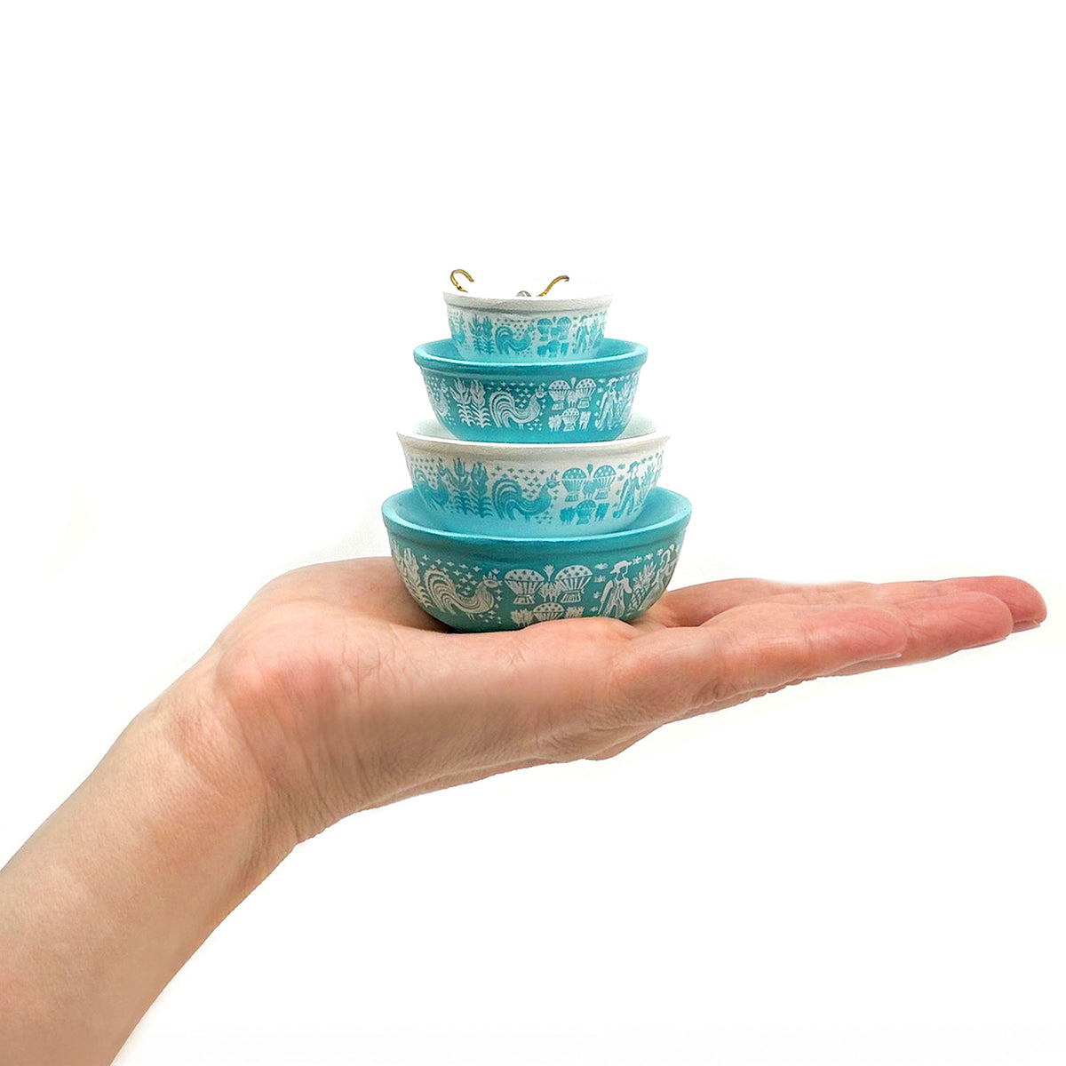 Mini Pyrex-inspired bowl ornament stack in teal/blue with decorative pattern and hanging loop